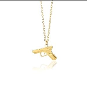 New Necklace With Pistol Shape Pendant. New with tags